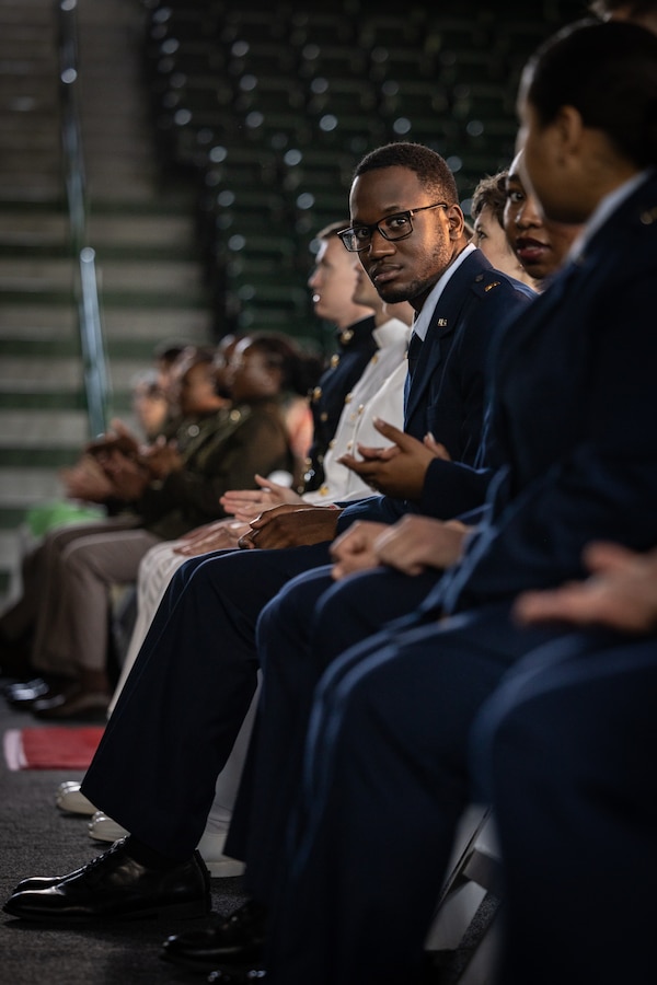 U.S. Air Force 2nd Lt. Josiah Burno looks across to his fellow service members during the Tulane University Reserve Officer Training Corps Joint Commissioning Ceremony at Tulane University, New Orleans, May 16, 2025. During the ceremony service members from several schools in the New Orleans area commissioned as officers into the Armed Forces of the United States. (U.S. Marine Corps photo by Staff Sgt. Scott Jenkins)