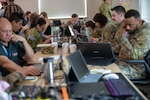 Members of the 136th Cyber Detachment, 54th Troop Command, New Hampshire Army National Guard, participate in Cyber Yankee, the joint defensive cyber training exercise, May 14, 2025, at the Edward Cross Training Complex, Pembroke, N.H. Blue Team 2 was composed of cyber professionals from the New Hampshire and Vermont National Guards, along with members of the Salvadoran Army, New Hampshire’s partner nation through the State Partnership Program. Together, they worked to counter a simulated cyberattack on critical infrastructure, strengthening regional coordination and international collaboration.