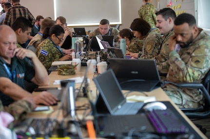 Members of the 136th Cyber Detachment, 54th Troop Command, New Hampshire Army National Guard, participate in Cyber Yankee, the joint defensive cyber training exercise, May 14, 2025, at the Edward Cross Training Complex, Pembroke, N.H.