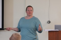Tifini Steif, Suicide Prevention Program Manager, 85th U.S. Army Reserve Support Command, teaches a class during the Tier 2 Ask Care Escort Suicide Prevention liaison training at the Paul G. Schulstad Army Reserve Center in Arlington Heights, Illinois, May 13-15, 205.