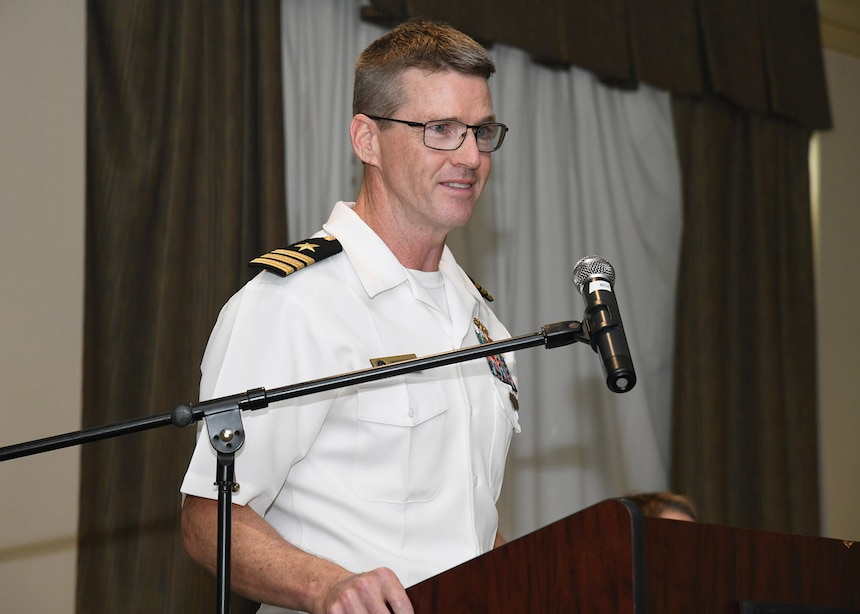 Cmdr. Kenneth Brooks addresses the audience after taking command of Naval Information Warfare Training Group (NIWTG) Norfolk during a change of command ceremony May 16. Cmdr. Brooks relieved Capt. Stephen McIntyre, as the Commanding Officer, during the ceremony. NIWTG provides unsurpassed information operations (IO) support to naval combatant and joint force commanders and leads the transformation of IO in defense of our nation. (U.S. Navy photo by Robert Fluegel/RELEASED)