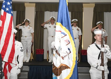 Capt. Meredith Schley, Commander, Naval Information Warfare Training Group, Capt. Stephen McIntyre, Commanding Officer, Naval Information Warfare Training Group Norfolk, Cmdr. Kenneth Brooks, and Capt. Ron O’Dell, Force Chaplain, Naval Information Forces, salute during the presentation of colors by the Fleet Weather Center Norfolk Color Guard during a change of command ceremony on May 16. Cmdr. Brooks relieved Capt. McIntyre as the Commanding Officer, Naval Information Warfare Training Group (NIWTG) Norfolk. NIWTG provides unsurpassed information operations (IO) support to naval combatant and joint force commanders and leads the transformation of IO in defense of our nation. (U.S. Navy photo by Robert Fluegel/RELEASED)