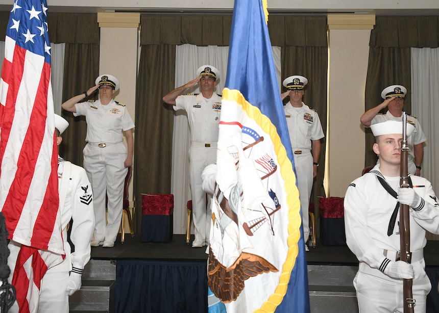 Capt. Meredith Schley, Commander, Naval Information Warfare Training Group, Capt. Stephen McIntyre, Commanding Officer, Naval Information Warfare Training Group Norfolk, Cmdr. Kenneth Brooks, and Capt. Ron O’Dell, Force Chaplain, Naval Information Forces, salute during the presentation of colors by the Fleet Weather Center Norfolk Color Guard during a change of command ceremony on May 16. Cmdr. Brooks relieved Capt. McIntyre as the Commanding Officer, Naval Information Warfare Training Group (NIWTG) Norfolk. NIWTG provides unsurpassed information operations (IO) support to naval combatant and joint force commanders and leads the transformation of IO in defense of our nation. (U.S. Navy photo by Robert Fluegel/RELEASED)
