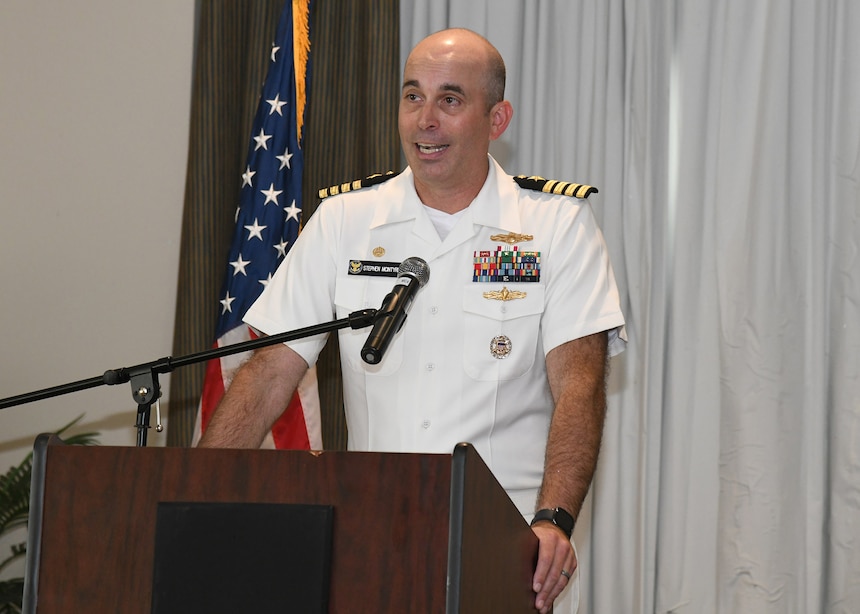 Capt. Stephen McIntyre, Commanding Officer, Naval Information Warfare Training Group (NIWTG) Norfolk, gives his farewell remarks during his Change of Command May 16. Cmdr. Kenneth Brooks relieved Capt. McIntyre as the Commanding Officer. NIWTG provides unsurpassed information operations (IO) support to naval combatant and joint force commanders and leads the transformation of IO in defense of our nation. (U.S. Navy photo by Robert Fluegel/RELEASED)