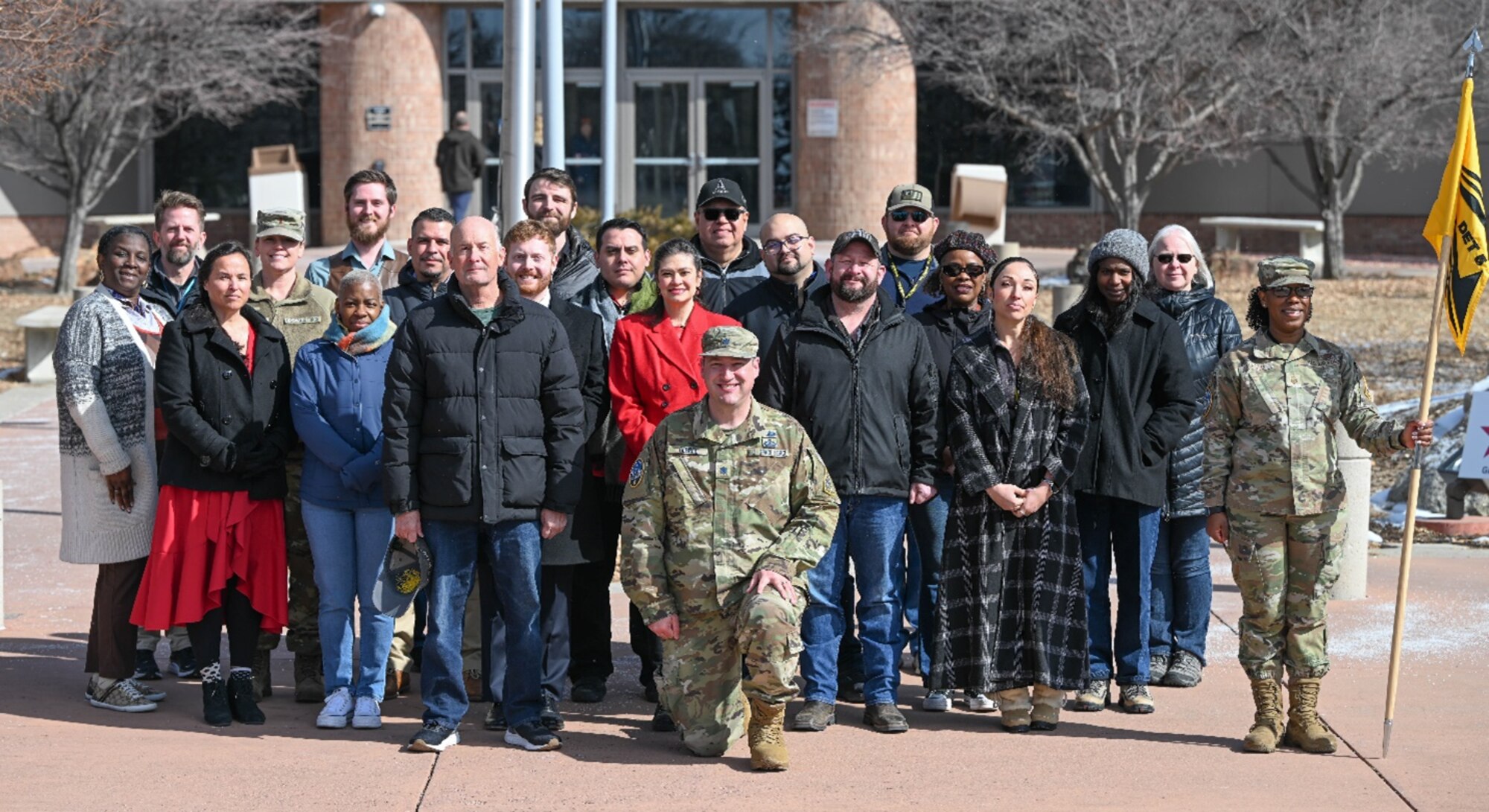 Lt. Col. Chuck DeBree (center) poses with his Det. 5 team at Peterson Space Force Base. Det. 5 supports more than 2,500 SSC personnel across six Program Executive Offices, the Warfighting Integration Office, Contracting and S-Staff (senior leadership and staff organizations) in more than 26 operating locations. Courtesy photo.