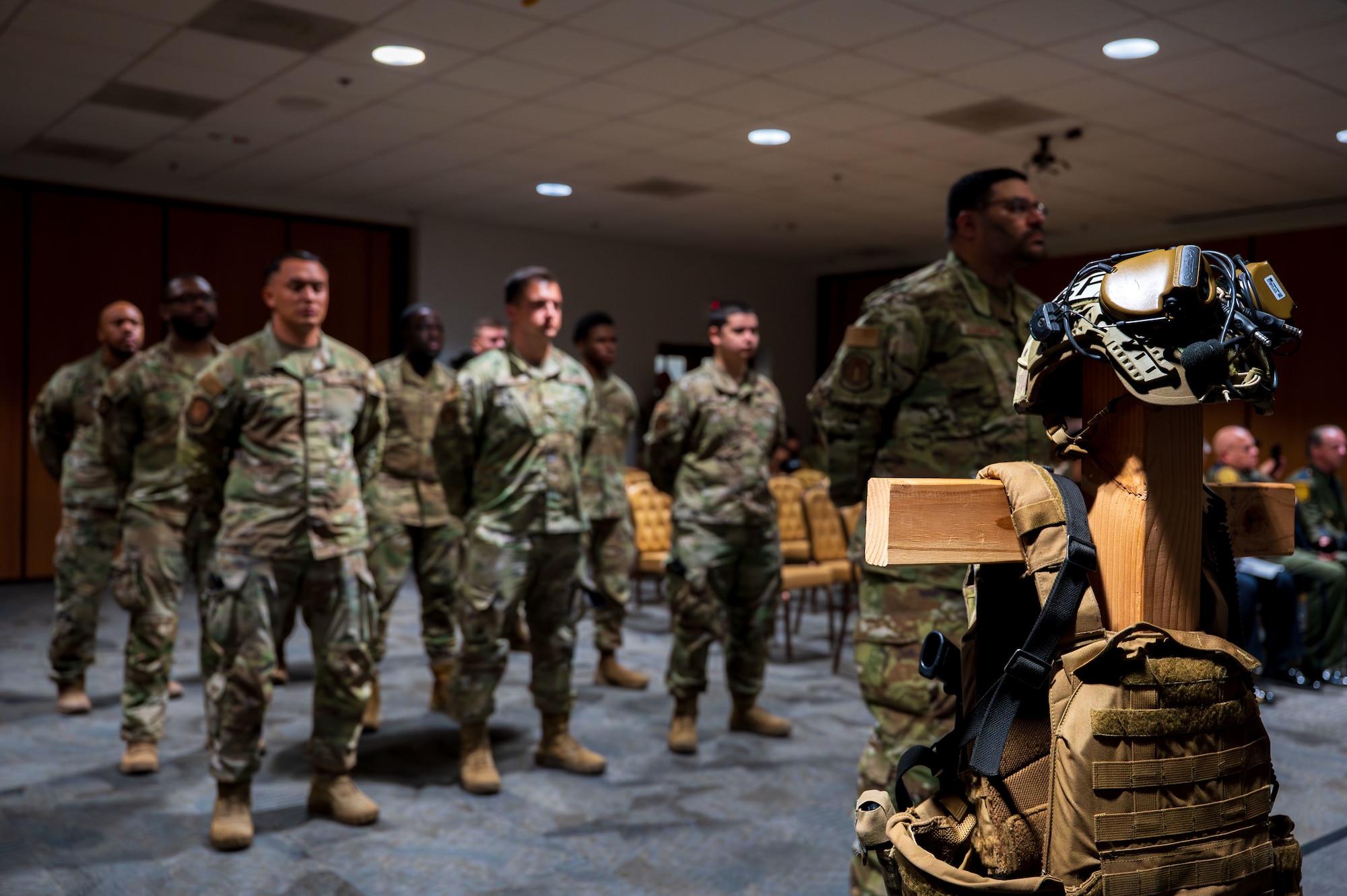 U.S. Airmen assigned to the 355th Security Forces Squadron stand in formation during a Final Guard Mount ceremony at Davis-Monthan Air Force Base, Arizona, May 16, 2025. This tradition paid tribute to Defenders whose Final Guard Mount unknowingly became their last. (U.S. Air Force photo by Senior Airman Jasmyne Bridgers-Matos)