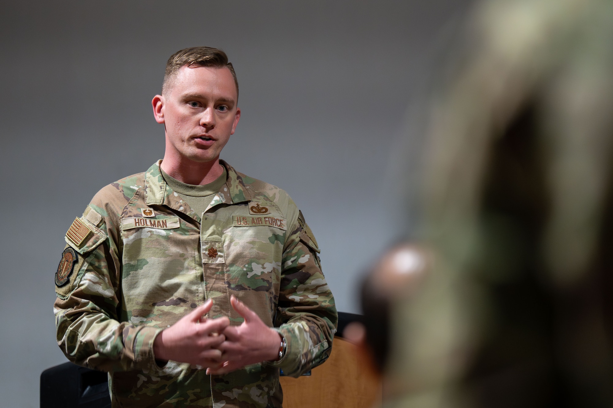 U.S. Air Force Maj. Steven Holman, 355th Security Force Squadron commander, gives a speech honoring current and past Defenders during a Final Guard Mount ceremony at Davis-Monthan Air Force Base, Arizona, May 16, 2025. The ceremony was an opportunity to remember those who paid the ultimate sacrifice. (U.S. Air Force photo by Senior Airman Jasmyne Bridgers-Matos)