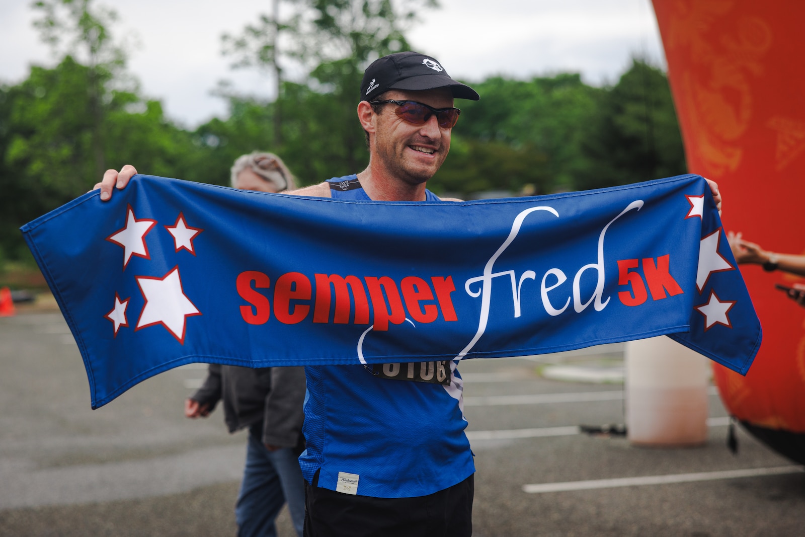 Mark Hopely, a native of Virginia, the male first-place finisher, poses for a photo at the 2025 Semper Fred 5K race in Fredericksburg, Virginia, May 17, 2025. The Semper Fred 5k is a family-friendly, all ages event in historic Fredericksburg, the day before the Marine Corps Historic Half. (U.S. Marine Corps photo by Lance Cpl. Braydon Rogers)