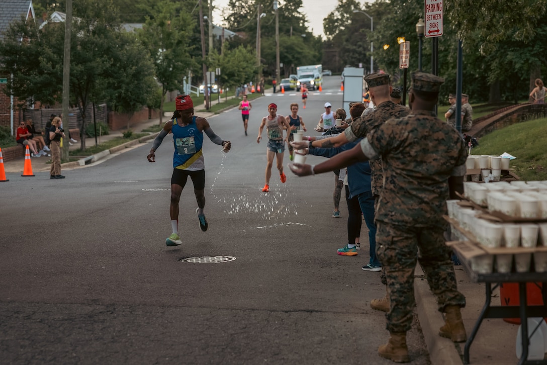 Jonathan Ladson, a native of Virginia, runs in the 2025 Marine Corps Historic Half in Fredericksburg, Virginia, May 18, 2025. The Historic Half is a 13.1-mile race weaved throughout Historic Downtown Fredericksburg, home to over 200 stores and several historic sites. The race generates community goodwill, fosters public relations, and increases advocacy for individual health while emphasizing the Marine Corps’ warrior ethos. (U.S. Marine Corps photo by Lance Cpl. Ethan Miller)