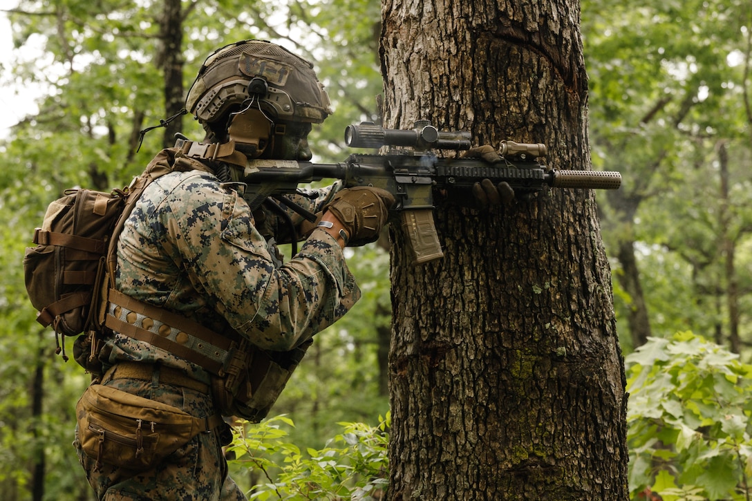 U.S. Marine Corps Lance Cpl. Myles Days, a rifleman with 2nd Marine Division, and a native of Nashville, Tennessee, shoots an M27 Infantry Automatic Rifle during a rifle squad competition at Marine Corps Base Quantico, Virginia, May 14, 2025. The Marine Corps Rifle Squad Competition is an annual competition that utilizes simulated combat conditions to challenge competitors with a wide variety of complex and realistic scenarios to determine which Marine rifle squad most effectively demonstrates their combat capabilities and operational proficiency. (U.S. Marine Corps photo by Cpl. Joshua Barker)