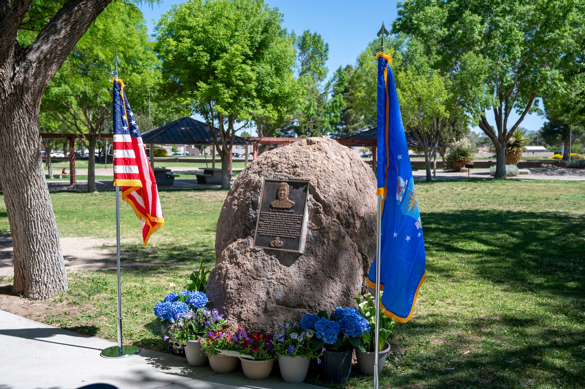 A plaque honoring U.S. Air Force Lt. Gen. Leo Marquez is displayed at Marquez Park on Kirtland Air Force Base, New Mexico, May 16, 2025. The plaque was rededicated during a ceremony recognizing Marquez’s legacy and contributions to Air Force logistics and maintenance. (U.S. Air Force photo by Senior Airman Jennifer Knope)