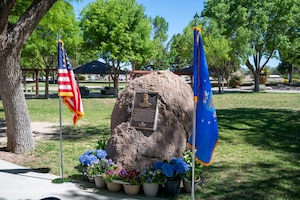 A plaque honoring U.S. Air Force Lt. Gen. Leo Marquez is displayed at Marquez Park on Kirtland Air Force Base, New Mexico, May 16, 2025. The plaque was rededicated during a ceremony recognizing Marquez’s legacy and contributions to Air Force logistics and maintenance. (U.S. Air Force photo by Senior Airman Jennifer Knope)