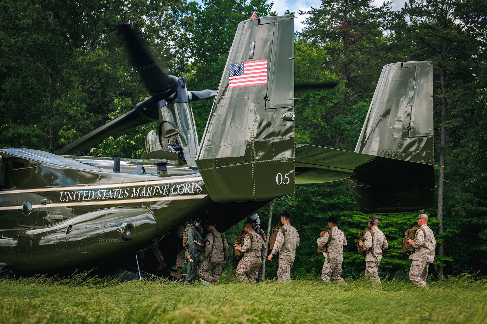 U.S. Marines with Marine Corps Air Facility Quantico board an MV-22B Osprey during a field exfiltration at The Basic School on Marine Corps Base Quantico, May 15, 2025. Marines with MCAF embarked on a two-day field exercise including events such as land navigation, a mess night, a machine-gun range and culminating with a field exfiltration. (U.S. Marine Corps photo by Lance Cpl. Braydon Rogers)