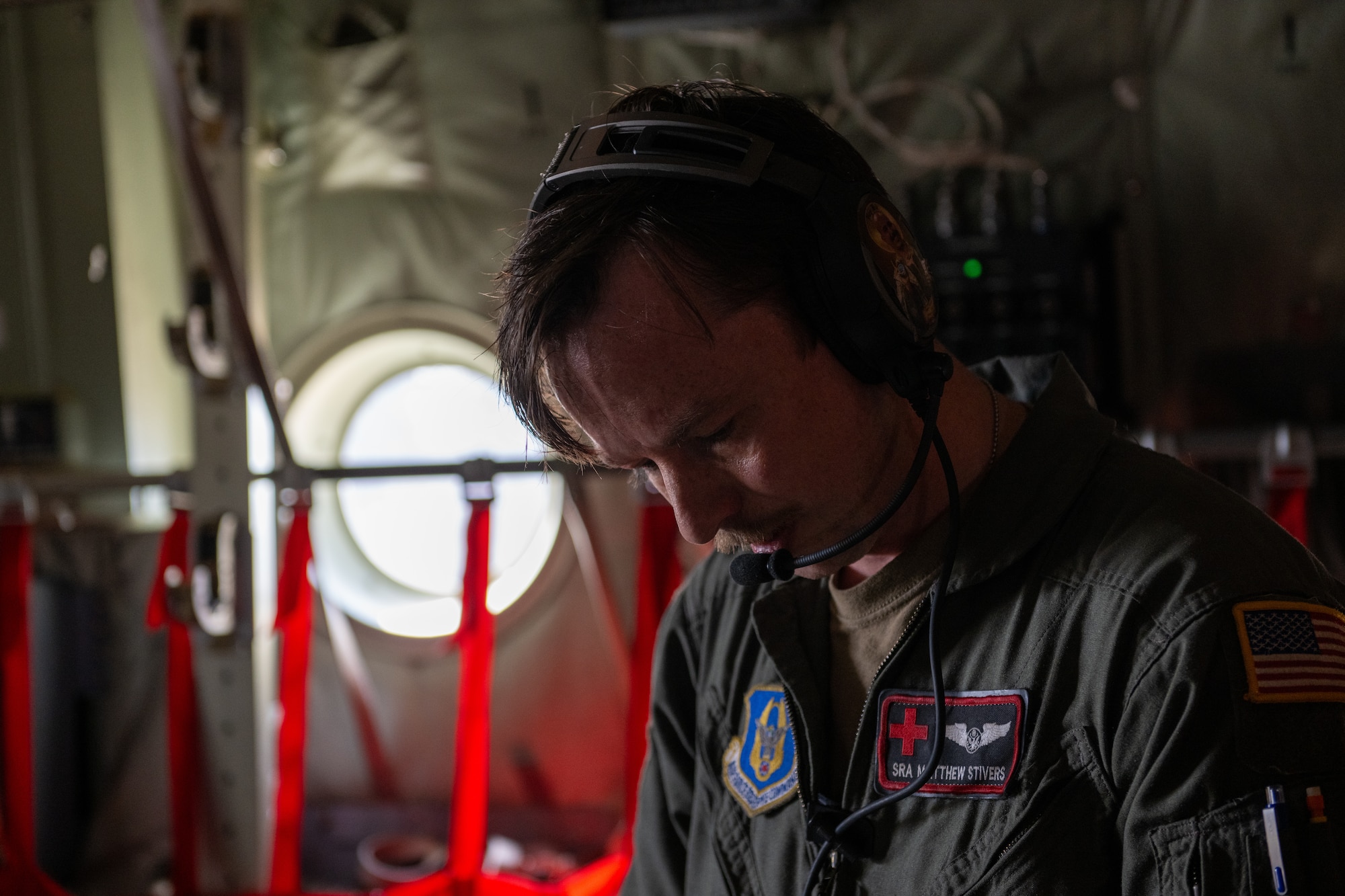 Senior Airman Matthew Stivers, 908th Aero-Medical Evacuation Squadron AE technician, goes over a checklist during an aero-medical evacuation training at Maxwell Air Force Base, Alabama, May 1, 2025. The AE personnel had to receive the patients, triage and ascertain their injuries, and load them in under 15 minutes which was accomplished safely. (U.S. Air Force photo by Airman 1st Class Iain Stanley)