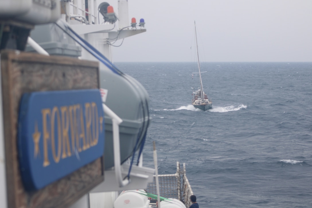 The crew of Coast Guard Cutter Forward (WMEC 911) rescued two people and their disabled 60-foot sailboat nearly 90 miles offshore Charleston, South Carolina, May 17, 2025. Forward's crew towed the sailboat to coastal waters, where a Coast Guard Station Charleston boat crew and a commercial salvage vessel took over and safely transported the two sailors and their boat to shore. (U.S. Coast Guard photo by Petty Officer 2nd Class Alexander Mclemore)