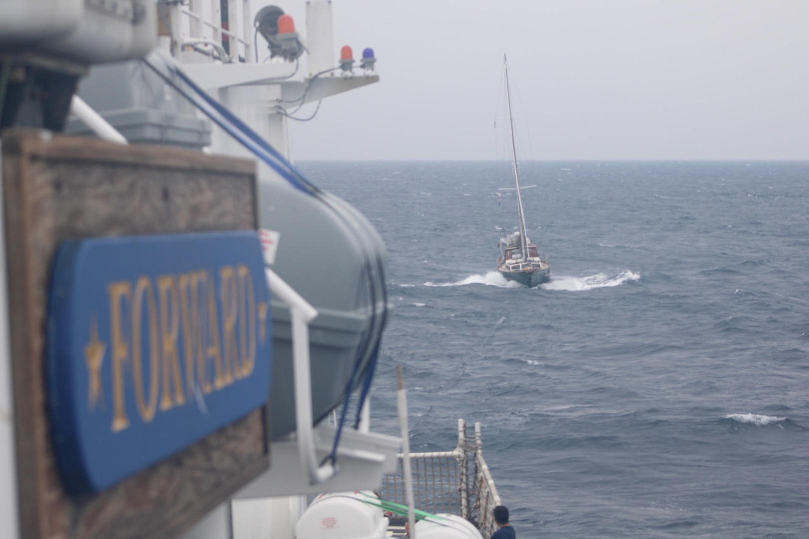 The crew of Coast Guard Cutter Forward (WMEC 911) rescued two people and their disabled 60-foot sailboat nearly 90 miles offshore Charleston, South Carolina, May 17, 2025. Forward's crew towed the sailboat to coastal waters, where a Coast Guard Station Charleston boat crew and a commercial salvage vessel took over and safely transported the two sailors and their boat to shore. (U.S. Coast Guard photo by Petty Officer 2nd Class Alexander Mclemore)