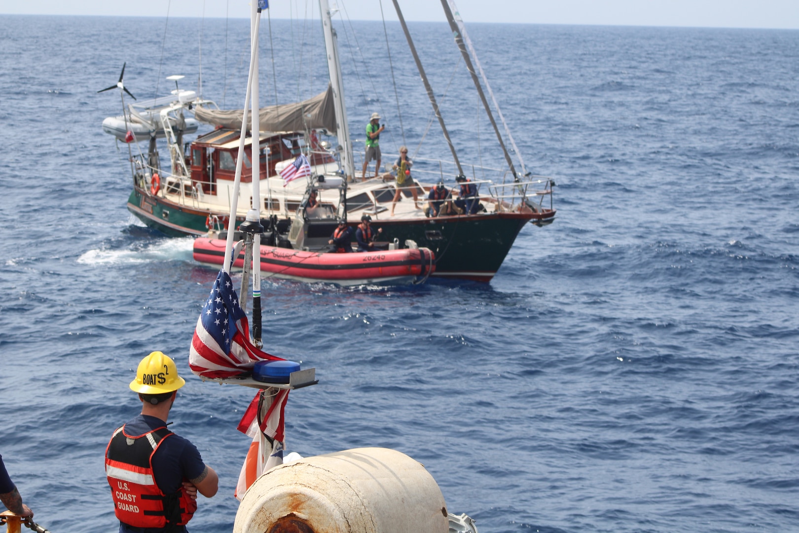 The crew of Coast Guard Cutter Forward (WMEC 911) rescued two people and their disabled 60-foot sailboat nearly 90 miles offshore Charleston, South Carolina, May 17, 2025. Forward's crew towed the sailboat to coastal waters, where a Coast Guard Station Charleston boat crew and a commercial salvage vessel took over and safely transported the two sailors and their boat to shore. (U.S. Coast Guard photo by Petty Officer 2nd Class Alexander Mclemore)