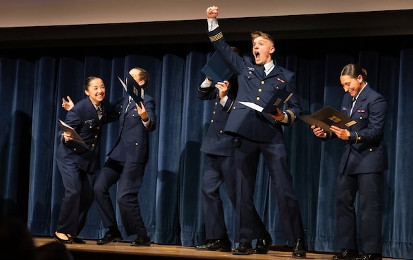 Cadets react to learning where they’ll be stationed after graduation at the 2025 Billet Night held March 6 at Coast Guard Academy (CGA) in New London, CT. For the first time this year, a matching algorithm was used to make assignments.