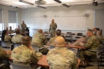 U.S. Army Command Sgt. Maj. John T. Raines III, Senior Enlisted Advisor to the Chief of the National Guard Bureau, speaks with senior enlisted service members during a town hall meeting at Kalaeloa, Hawaii, Jan. 12, 2025. Raines came to Hawaii to talk to service members about challenges they are facing in the Hawaii National Guard in order to strengthen our military in the Pacific region.