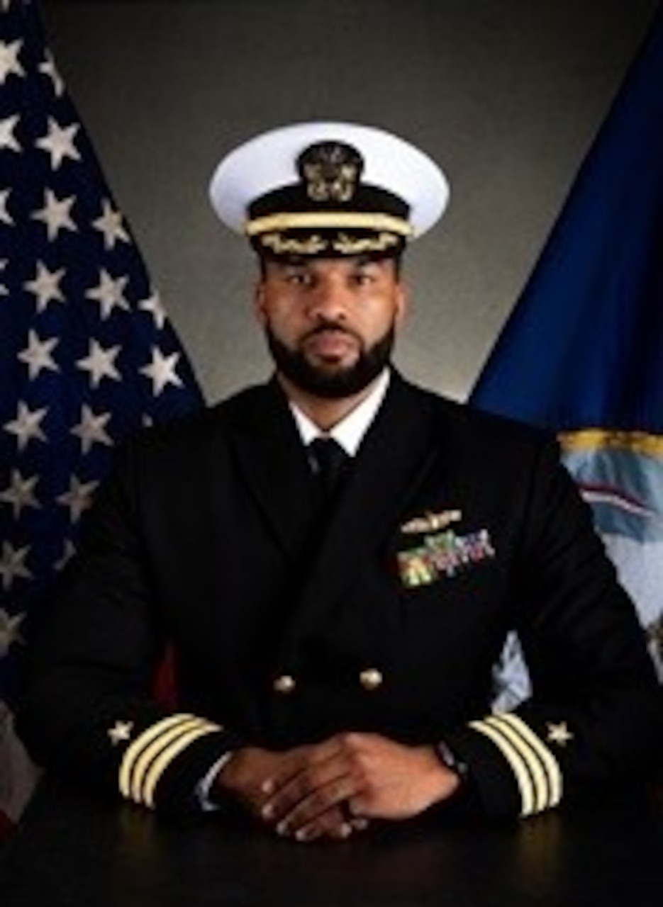 Commander Curtis Sharp