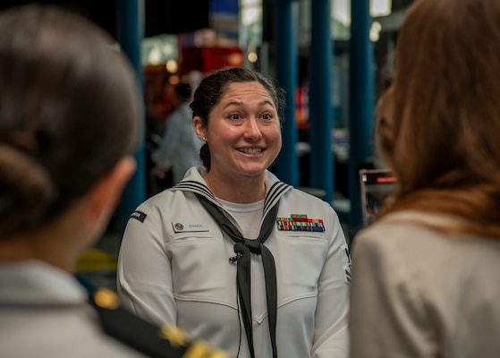 Huntsville, Ala. (April 21, 2025) Hospital Corpsman 2nd Class Marissa Stancil, from Gunnersville, Ala., assigned to Navy Medicine Readiness and Training Command Bremerton, gives an interview at the Space and Rocket Center during Huntsville Navy Week. Navy Weeks are designed to connect Americans with their Navy and showcase why today’s Navy is important to America’s prosperity and its national defense. (U.S. Navy photo by Mass Communication Specialist 2nd Class Jason Waite)