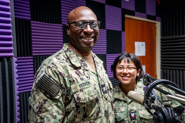 250512-N-TY711-4699 SIGONELLA, Italy. (May 12, 2025) Captain TaRail A. Vernon, Commanding Officer of U.S. Naval Hospital (USNH) Sigonella, at AFN Sigonella during a recording for an episode of Patient Informational Minute with Captain Vernon and Friends. This month’s guest speaker was Hospital Corpsman Second Class, Yvonne Elizalde, Pharmacy Technician, assigned to USNH Sigonella. (U.S. Navy photo by Lieutenant Commander Brandi Gibson)