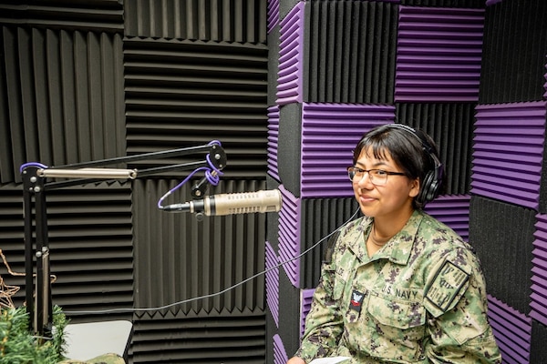 250512-N-TY711-4347 SIGONELLA, Italy. (May 12, 2025) Hospital Corpsman Second Class, Yvonne Elizalde, Pharmacy Technician, assigned to U.S. Naval Hospital (USNH) Sigonella, at AFN Sigonella during a recording for an episode of Patient Informational Minute with Captain Vernon and Friends. (U.S. Navy photo by Lieutenant Commander Brandi Gibson)