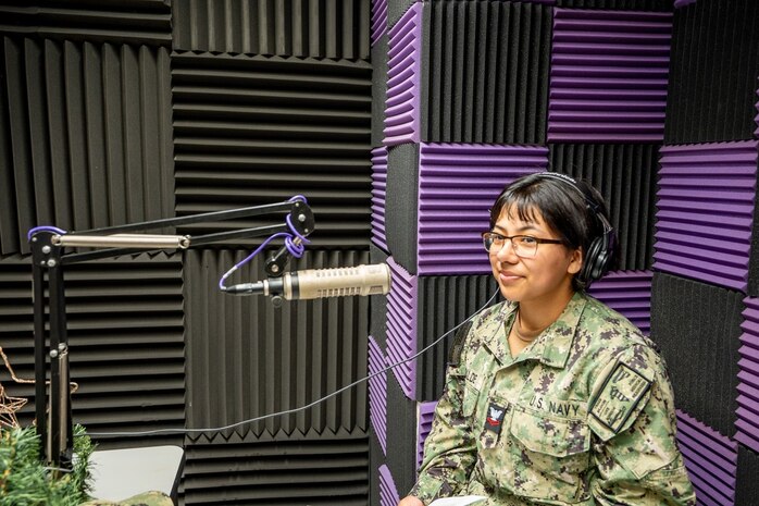 250512-N-TY711-4347 SIGONELLA, Italy. (May 12, 2025) Hospital Corpsman Second Class, Yvonne Elizalde, Pharmacy Technician, assigned to U.S. Naval Hospital (USNH) Sigonella, at AFN Sigonella during a recording for an episode of Patient Informational Minute with Captain Vernon and Friends. (U.S. Navy photo by Lieutenant Commander Brandi Gibson)