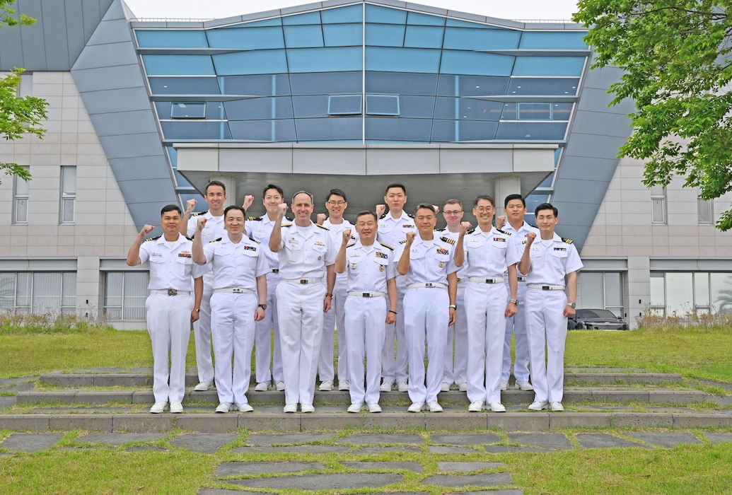 Rear Adm. Kang Dong-goo, commander, Republic of Korea (ROK) Navy Submarine Force, Rear Adm. Lincoln Reifsteck, commander, Submarine Group (CSG) 7, and their staff pose for a picture at Jeju Island, May 16, 2025, for the 60th Submarine Warfare Committee Meeting (SWCM).