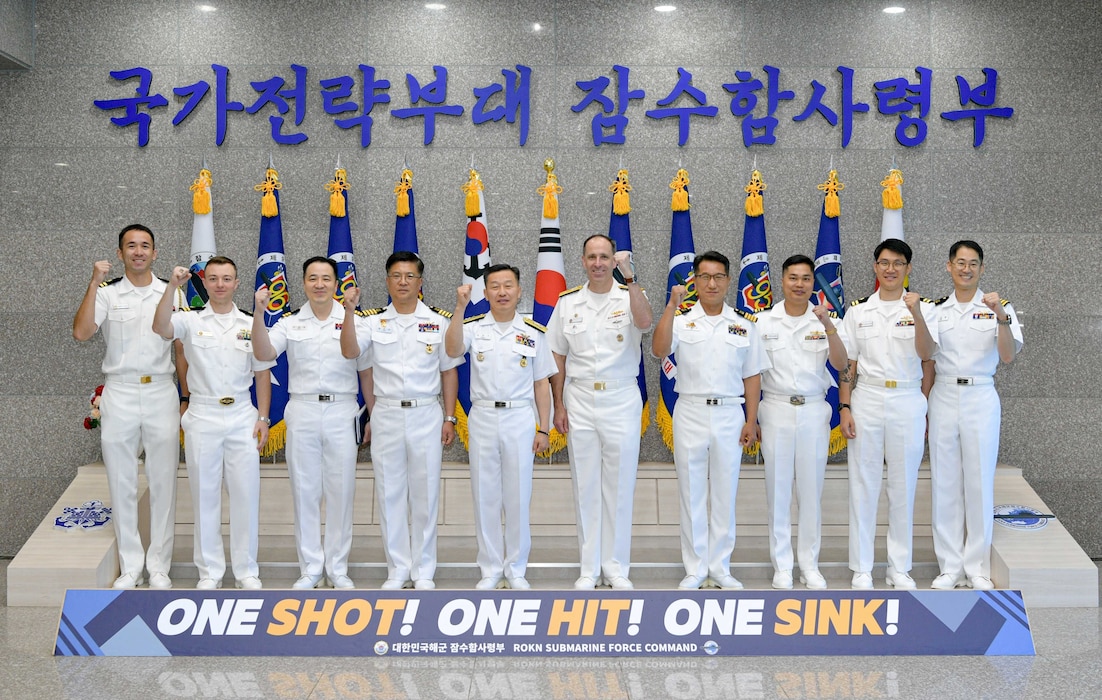 Rear Adm. Kang Dong-goo, commander, Republic of Korea (ROK) Navy Submarine Force, Rear Adm. Lincoln Reifsteck, commander, Submarine Group (CSG) 7, and their staff pose for a picture at Jeju Island, May 16, 2025, for the 60th Submarine Warfare Committee Meeting (SWCM).