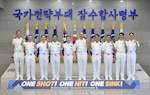 JEJU ISLAND, South Korea (May 16, 2025) Rear Adm. Kang Dong-goo, commander, Republic of Korea (ROK) Navy Submarine Force, Rear Adm. Lincoln Reifsteck, commander, Submarine Group (CSG) 7, and their staff pose for a picture at Jeju Island, May 16, 2025, for the 60th Submarine Warfare Committee Meeting (SWCM). SWCM complements the many combined port visits, exercises, training, operations, and other military cooperation activities by the U.S. and ROK submarine commands. CSG-7 directs forward-deployed combat-capable forces across the full spectrum of undersea warfare throughout the Western Pacific, Indian Ocean and Arabian Sea. (Photo courtesy of ROK Public Affairs)