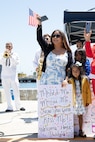Family and friends watch as the Los Angeles-class fast-attack submarine USS Alexandria (SSN 757) returns to Naval Base Point Loma following a seven-month deployment to the U.S. Indo-Pacific Command area of responsibility, May 15, 2025.