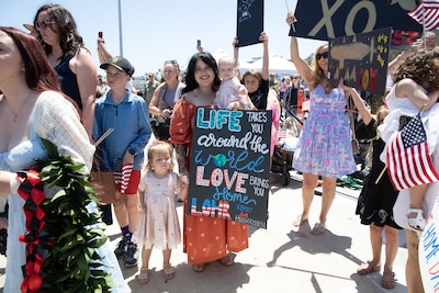 Family and friends watch as the Los Angeles-class fast-attack submarine USS Alexandria (SSN 757) returns to Naval Base Point Loma following a seven-month deployment to the U.S. Indo-Pacific Command area of responsibility, May 15, 2025.