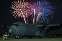 A U.S. Air Force C-130J Super Hercules assigned to the 36th Airlift Squadron sits on the flight line during the 2025 Japanese-American Friendship Festival fireworks display at Yokota Air Base, Japan, May 18, 2025.