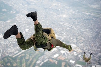 YOKOTA AIR BASE, TOKYO, Japan (May 18, 2025) — U.S. Marine Corps Marines assigned to the 3rd Reconnaissance Battalion conduct a military free fall demonstration during the Japanese-American Friendship Festival 2025 at Yokota Air Base, Japan, May 18,...