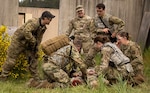 A joint effort...Land, sea and air assets of the U.S. military assigned in the Pacific Northwest came together to hone life-saving techniques and strategies during a joint scenario-based field Tactical Combat Casualty Care exercise, May 15, 2024 (By Mass Communication Specialist 2nd Class Jennifer Benedict, NHB/NMRTC Bremerton public affairs).