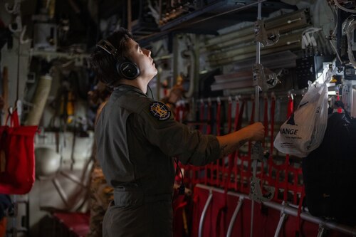 Senior Airman Gabriel Romero, 71st Rescue Squadron HC-130J Combat King II loadmaster, prepares the aircraft for aero-medical evacuation crew during a training exercise at Maxwell Air Force Base, Alabama, May 1, 2025. As combat search and rescue training exercises like this prove invaluable during any real world scenarios. (U.S. Air Force photo by Airman 1st Class Iain Stanley)