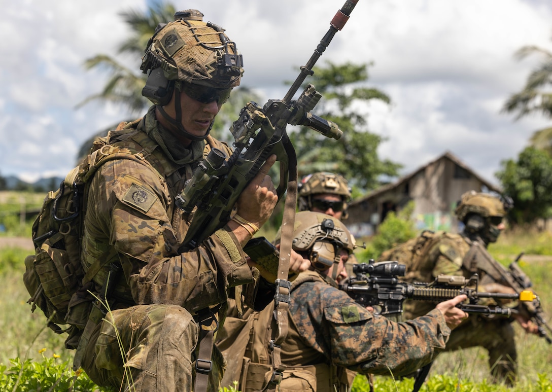 U.S. Marines with 2nd Battalion, 1st Marine Regiment, Marine Rotational Force – Darwin 25.3, and Australian Army soldiers with 5th/7th Battalion, The Royal Australian Regiment, fire their weapons during a Maritime Key Terrain Security Operations event, in support of Exercise Balikatan 25 near Puerto Princesa, Palawan, Philippines May 5, 2025. Balikatan is a longstanding annual exercise between the U.S. and Philippine armed forces designed to strengthen the alliance, showcase the capable combined force, and demonstrate the commitment to regional security and stability. (U.S. Marine Corps photo by Cpl. Keegan Jones)