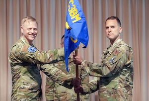 HANSCOM, AIR FORCE BASE, Mass., (May 6, 2025) – Maj. Gen. Luke Cropsey, left, appoints Col. Grant Spear as the Airspace Mission Planning Division’s senior materiel leader at the Hanscom Minuteman Commons, here, May 6, 2025. The division is part of the Department of the Air Force’s Program Executive Office for Command, Control, Communications and Battle Management. Cropsey is C3BM’s program executive officer. (Official Air Force Photo by Richard Blumenstein).