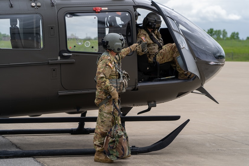 Maj. Curtis Lowe, Chief Warrant Officer 3 James Ashbrook, and Chief Warrant Officer 3 Patrick Ferguson with Charlie Company, 1st Battalion, 376th Aviation Regiment, 751st Troop Command, 63rd Theater Aviation Brigade, Kentucky Army National Guard conducted a training flight to the rooftop of University of Kentucky Albert B. Chandler Hospital in Lexington, Ky. on May 5, 2025.