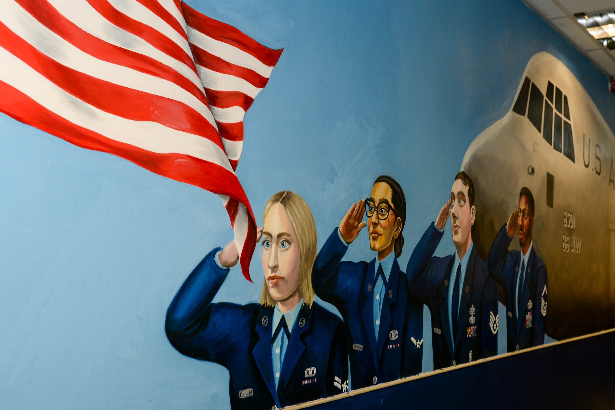 A mural sits in hallway.