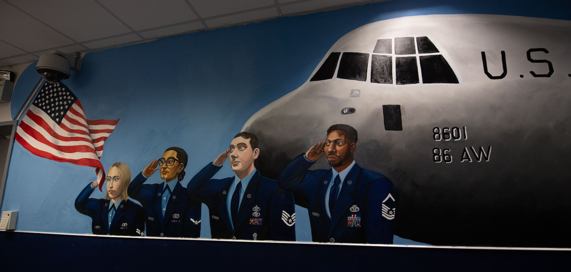 A mural is displayed in hallway.