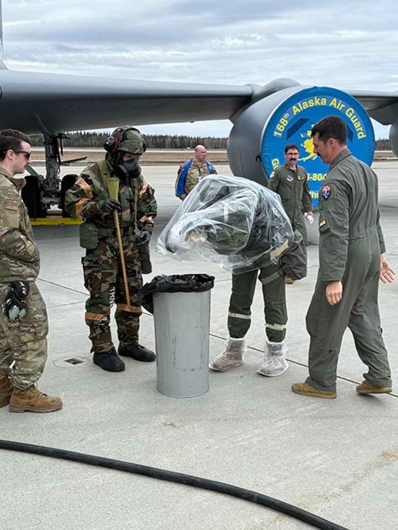 Aircrew members with the 168th Wing Operations Group participate in hands-on CBRN training during the May drill weekend at Eielson Air Force Base, Alaska, May 3, 2025.