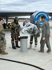 Aircrew members with the 168th Wing Operations Group participate in hands-on CBRN training during the May drill weekend at Eielson Air Force Base, Alaska, May 3, 2025.