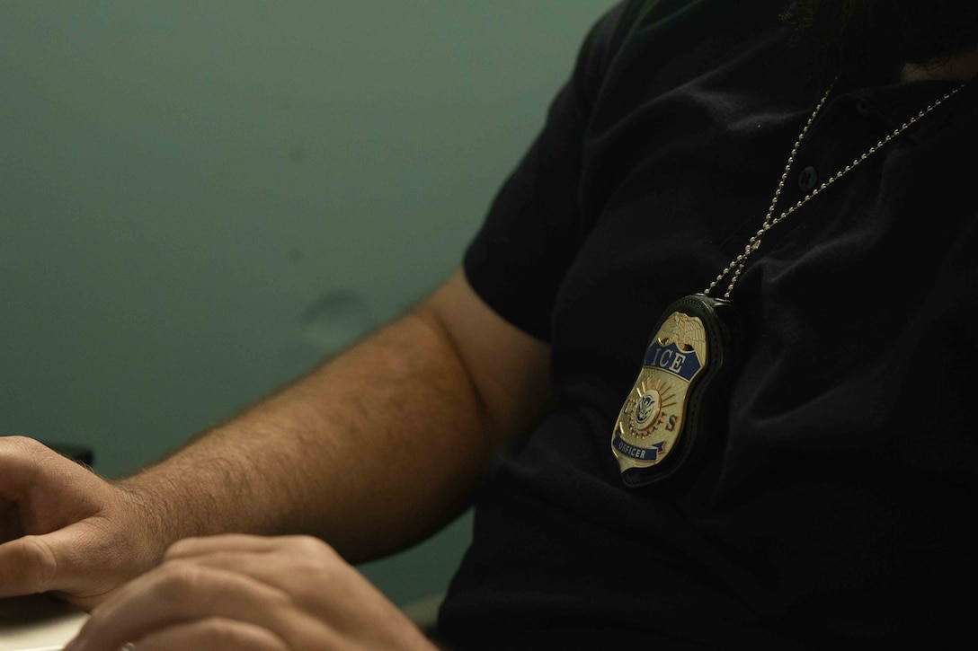 A U.S. Immigration and Customs Enforcement agent conducts credential checks in coordination with installation security and access requirements at Marine Corps Base Camp Pendleton, California, May 15, 2025. This activity supports ongoing efforts to ensure the safety and security of the installation and its personnel. For more information about base access requirements, visit https://www.pendleton.marines.mil/Main-Menu/Base-Access/ (U.S. Marine Corps photo by Cpl. Jacqueline Akamelu)