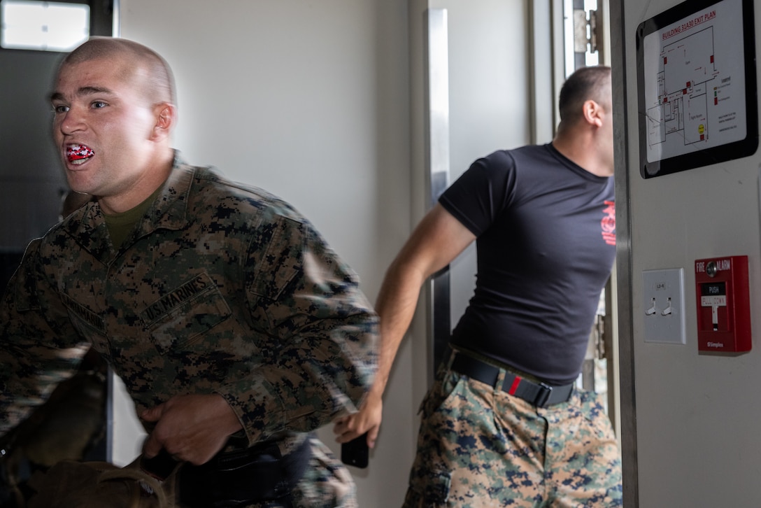 U.S. Marine Corps Cpl. William Santamaria, an amphibious combat vehicle repair technician with Assault Amphibian School, Training Command, runs during a martial arts instructor course at Marine Corps Base Camp Pendleton, California, May 2, 2025.