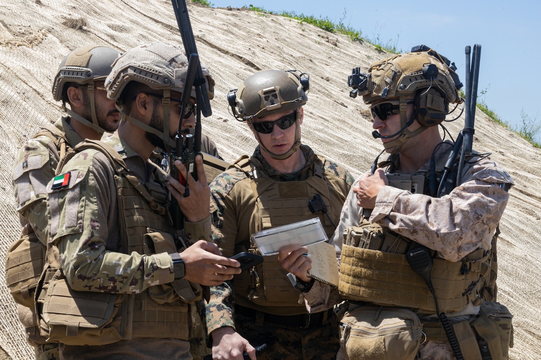 U.S. Marines with 1st Air Naval Gunfire Liaison Company, I Marine Expeditionary Force Information Group, and members of the United Arab Emirates Presidential Guard coordinate close air support during UAE Unit Enhancement Training at Marine Corps Base Camp Pendleton, California, May 7, 2025.