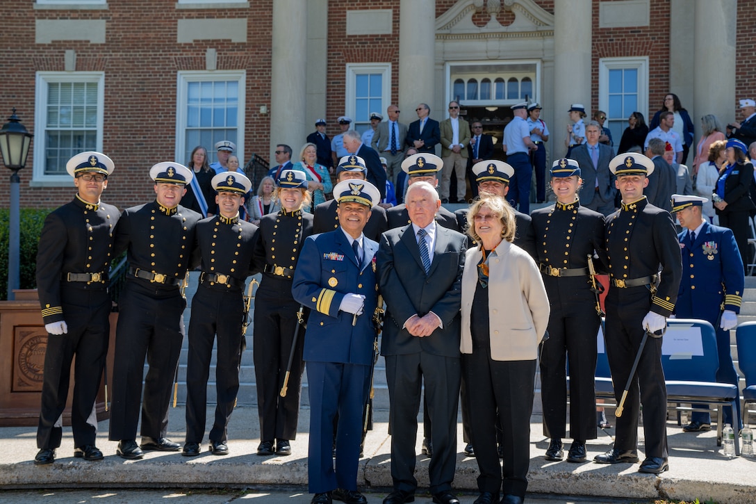 U.S. Coast Guard Academy (USCGA) Superintendent Rear Adm. Mike Johnston, Dr. James Tyler (front left to right) and regimental staff pose for a photo during regimental review at USCGA, New London, Connecticut, May 20, 2025. USCGA recognized Dr. James Tyler with the Scientæ Cedit Mare Award which reflects the importance of knowledge and education in mastering the challenges of the sea. (U.S. Coast Guard photo by Petty Officer Third Class Leo Avila.)