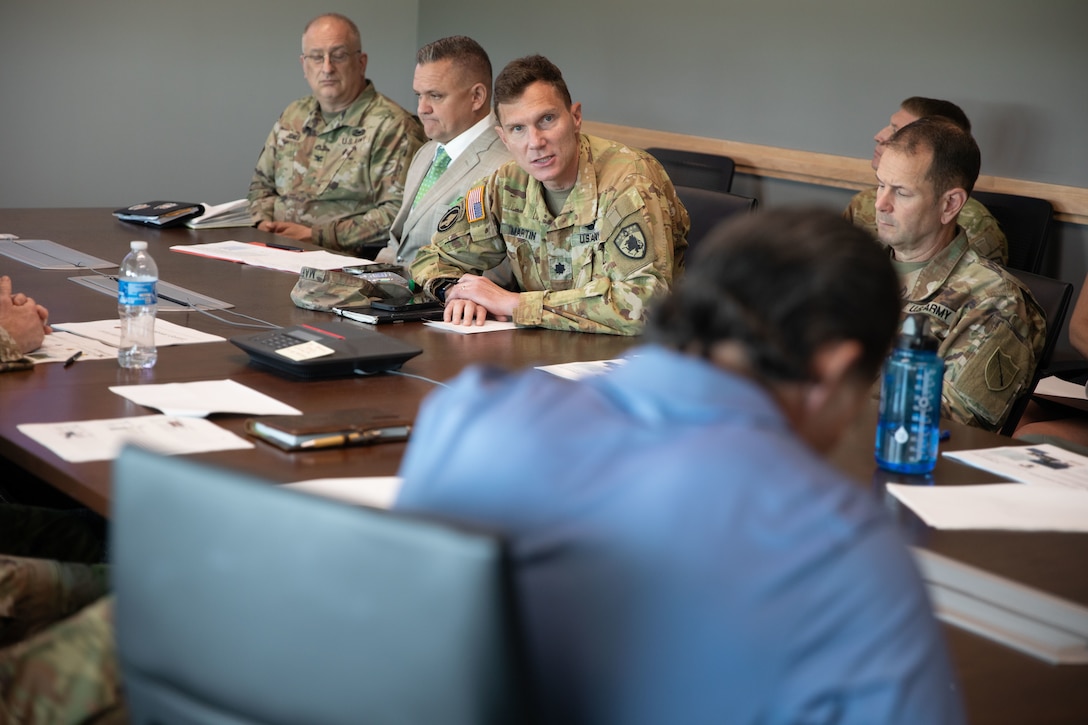 U.S. Army LTC Steven Martin, commander of the Army Aviation Support Facility, talks to Kentucky Civilian Aide to the Secretary of the Army (CASA) retired Army Col. Lance O’Bryan, about Kentucky National Guard aviation capabilities and equipment, at Boone National Guard Center, Frankfort, April 30, 2025. Kentucky National Guard senior leadership along with directorates met with O’Bryan to highlight the Kentucky National Guard and the organization’s capabilities.  (U.S. Army photo by Milt Spalding)