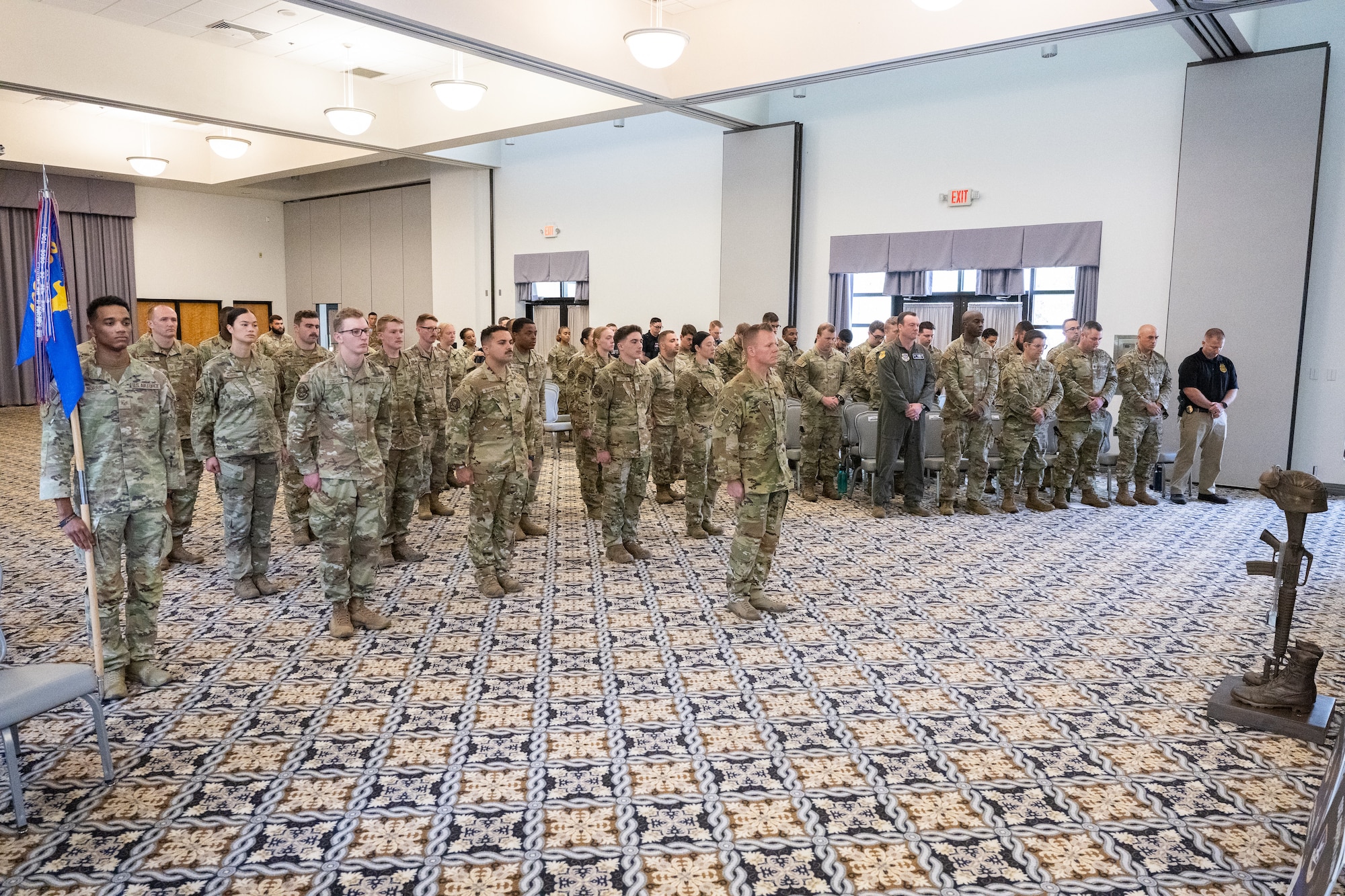 Members of the 436th Security Forces Squadron stand in formation during a memorial service at the conclusion of Police Week at Dover Air Force Base, Delaware, May 16, 2025. National Police Week was established in 1962 to honor law enforcement officers and to commemorate those who have lost their lives in the line of duty. (U.S. Air Force photo by Mauricio Campino)